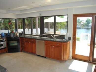 Kitchen with swimming pool view